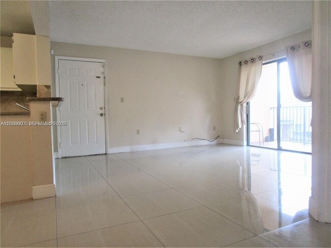 Photo - 9491 Palm Cir S Unit 205