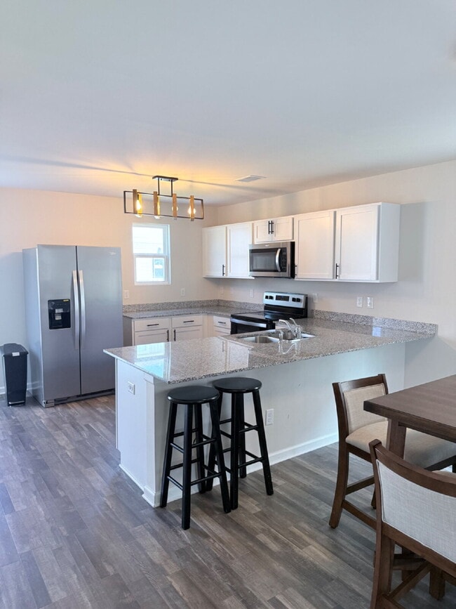 Photo - "Charming Coastal Retreat: 3-Bedroom on Is...