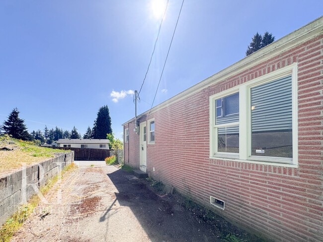 Building Photo - Timeless Charm Meets Comfort – 2-Bedroom Brick Home with Fireplace & Fenced Yard