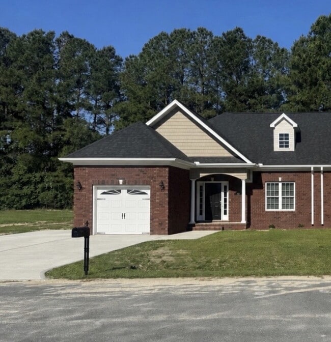 Building Photo - Low Maintenance Lifestyle! GORGEOUS 2 BR | 2 BA Brick Duplex in Rosewood (Goldsboro) *Lawn Care/T...