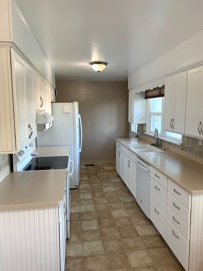 Photo - Four Bedroom, Two and Half Bath with a Large Yard to enjoy!!