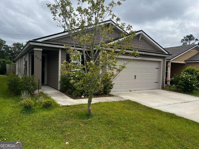 Building Photo - 209 Teakwood Dr