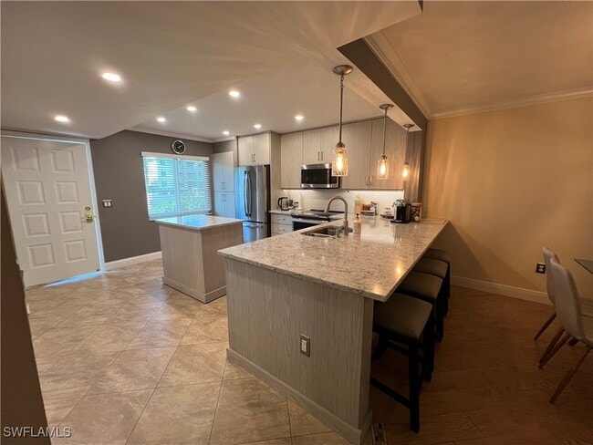 Building Photo - 3051 Sandpiper Bay Cir Unit I102