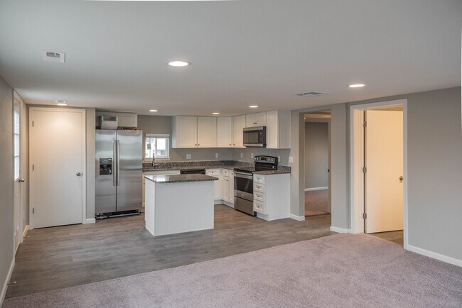 Photo - Remodeled home! Granite! SS Appliances!