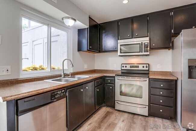 Building Photo - 9451 Carlton Oaks Dr Unit F Rental