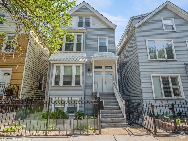 Building Photo - 1305 W Barry Ave Unit 1R Rental