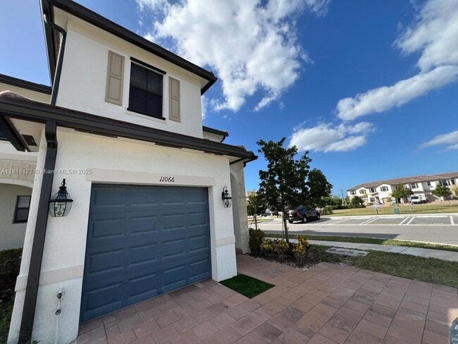 Photo - 11066 W 33rd Ln Townhome