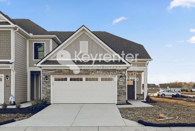 Photo - Located in Westfield, IN, this attractive 3-bedroom, 2.5-bath home sits on a corner lot within an...