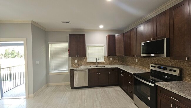 Building Photo - 5802 Twisted Pine Ct Unit E Rental