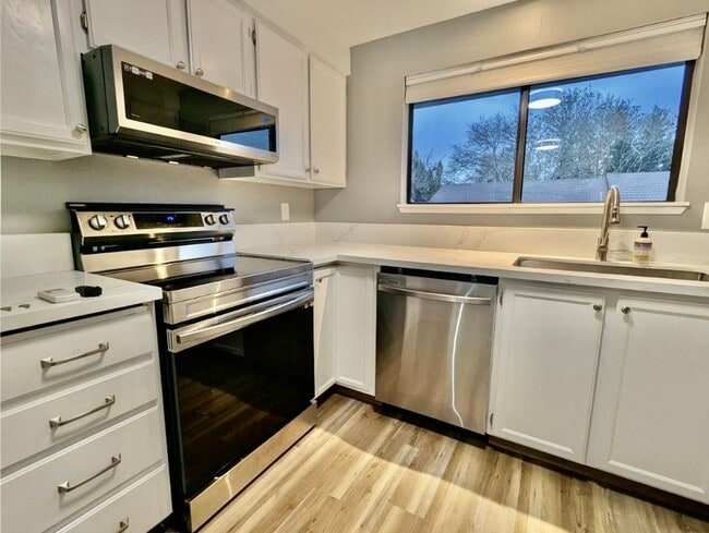Photo - Stunning 2 Bedroom Condo with Fireplace, Modern Upgrades and Air Conditioning!