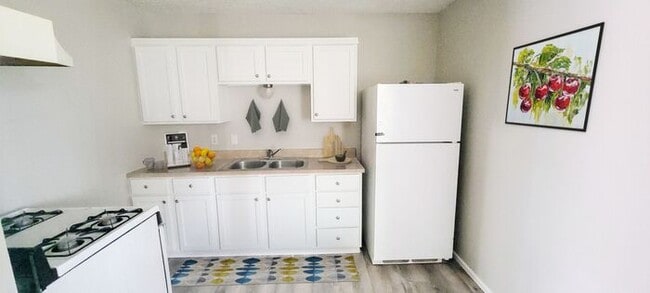 Building Photo - Cozy 1 Bed, 1 Bath + Unlimited Laundry! Rental