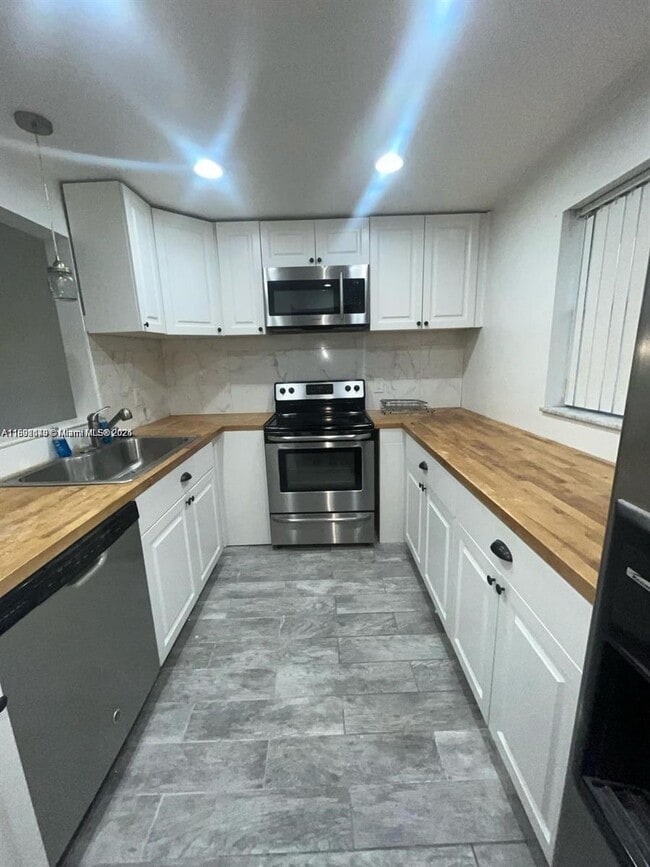 Building Photo - 8000 Lagos De Campo Blvd Unit A-103