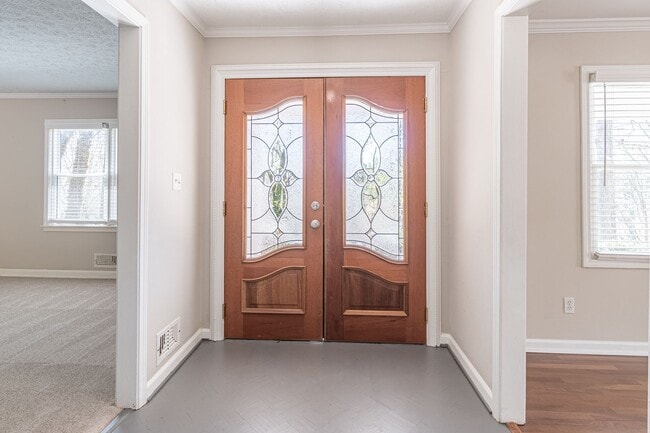 Photo - Discover this spacious 5-bedroom, 3-bath home in a highly sought after area in Roswell, GA, with ...
