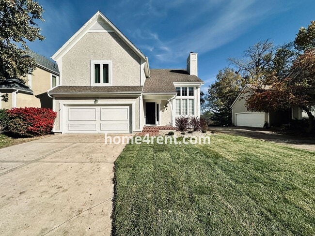 Photo - Maintenance Free Living w/ Hardwood Floors, Open Layout, Granite Counters, Finished Basement!