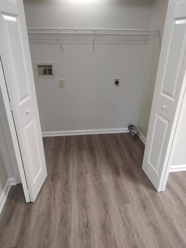 Laundry area - 210 W 17th St Unit #9