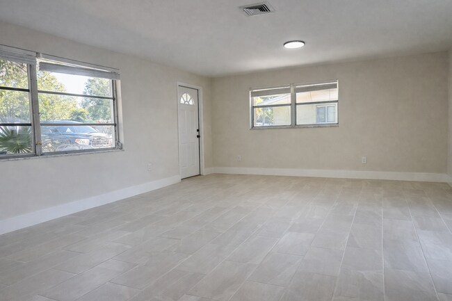 Photo - Beautifully Fully Remodeled 3-Bedroom Home with Carport, Indoor Laundry & Huge Fenced Yard!