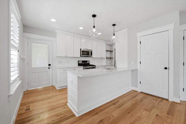 Photo - Charming Updated 4B/2.5B Home with Fenced Yard & Parking Included