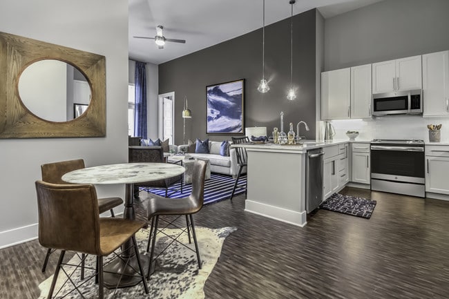 Luxury vinyl plank flooring in kitchen, living and dining room