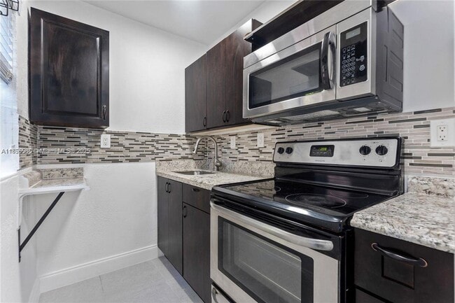 Building Photo - 9533 NW 3rd Ave Unit REAR Rental
