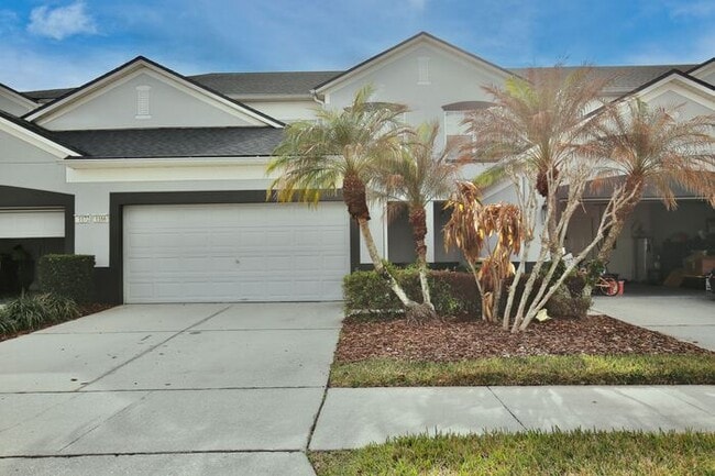 Building Photo - Beautiful 3/3.5 Townhome with a Spacious 2 Car Garage in the Gate Guarded Community of Spring Isl...