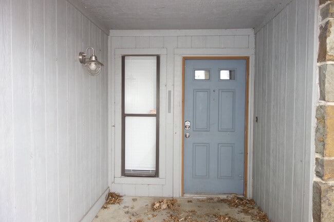 Front Covered Entry - 6604 S Utica Pl