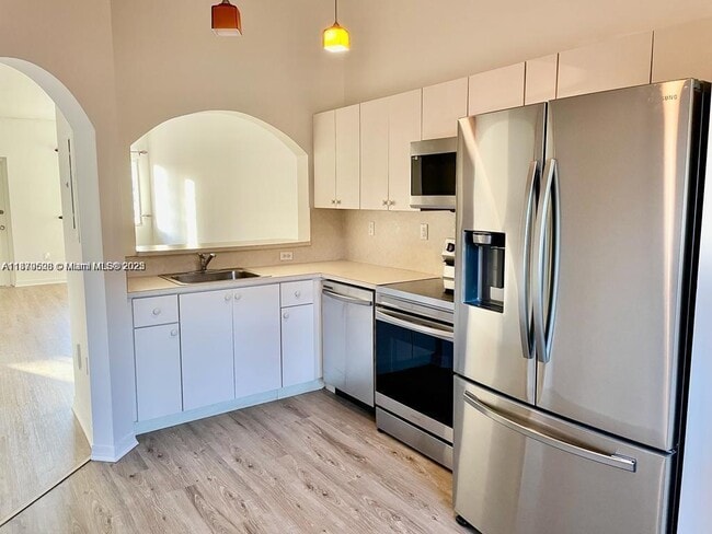 Building Photo - 975 NE 33rd Terrace Unit 203 Rental