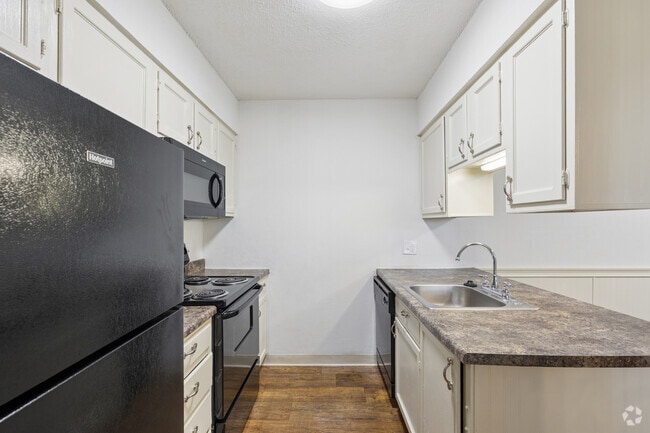 3BR, 2BA - 1,100SF - Kitchen - Tall Oaks Apartments