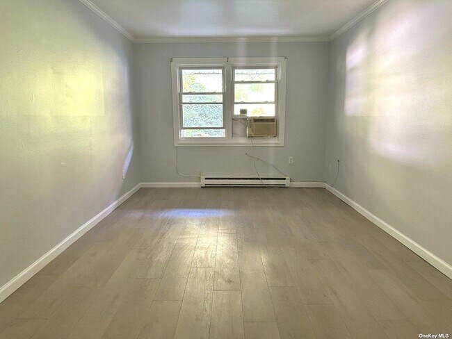 Photo - 13-35-35 Bell Blvd Unit 1 FL