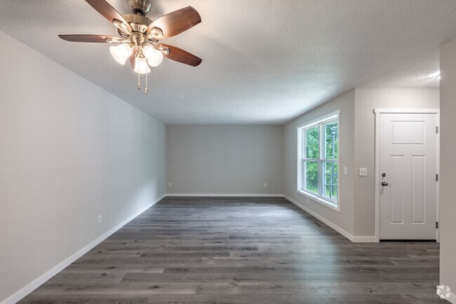 2BR, 2BA - 838SF - Side-By-Side - Living Room - Cottages of Stillwater