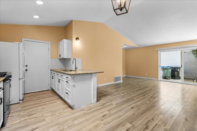 Photo - Bright Single Story Home with Open Layout and Private Yard