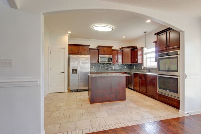 Photo - Stunning Five Bedroom With Hardwoods, Fireplace and Covered Patio in Sunset Meadows