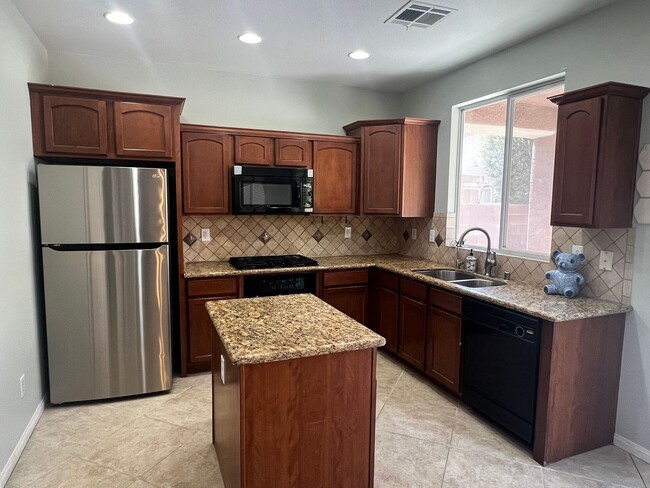 Photo - Spacious 4-Bedroom Mountains Edge Home with Downstairs Suite, Balcony & Covered Patio