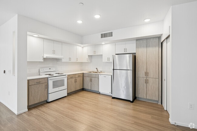 3BR, 2BA - 1,100SF - Kitchen - Mid-City Family Apts - Affordable Housing