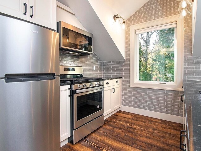 Photo - Expansive Loft-Style Carriage House in Private Haller Lake Estate