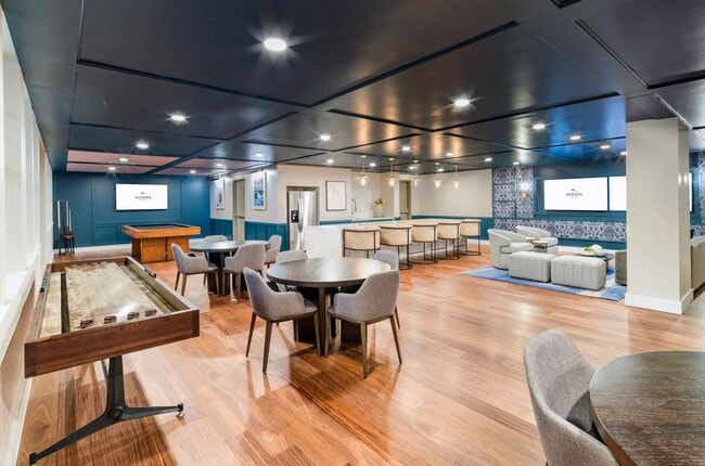Unwind and play at Modera Waugh! Explore the fun in our stylish game room, complete with a pool table for your perfect break from the everyday. Elevate your leisure time in Houston!