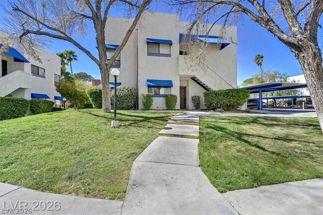 Building Photo - 2625 Red Rock St Unit 101