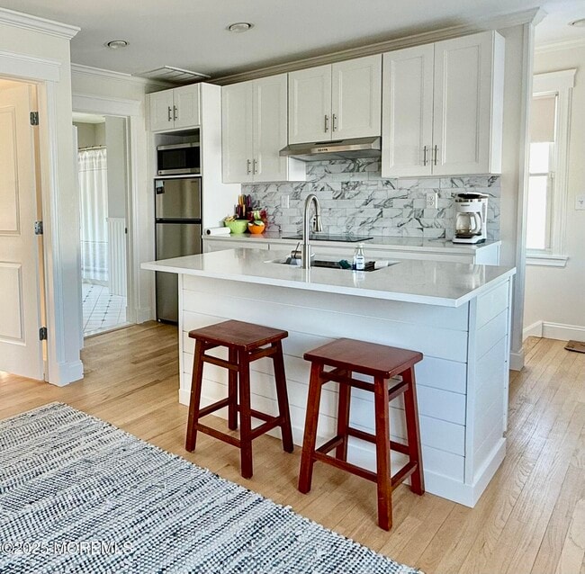 Photo - 111 4th Ave Unidad REAR