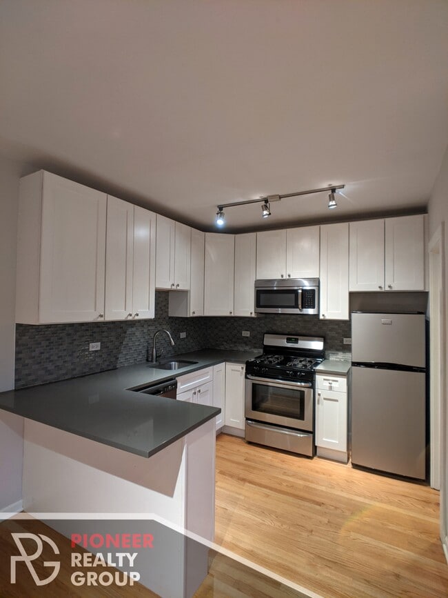 Building Photo - 2832 W Palmer St Unit 307