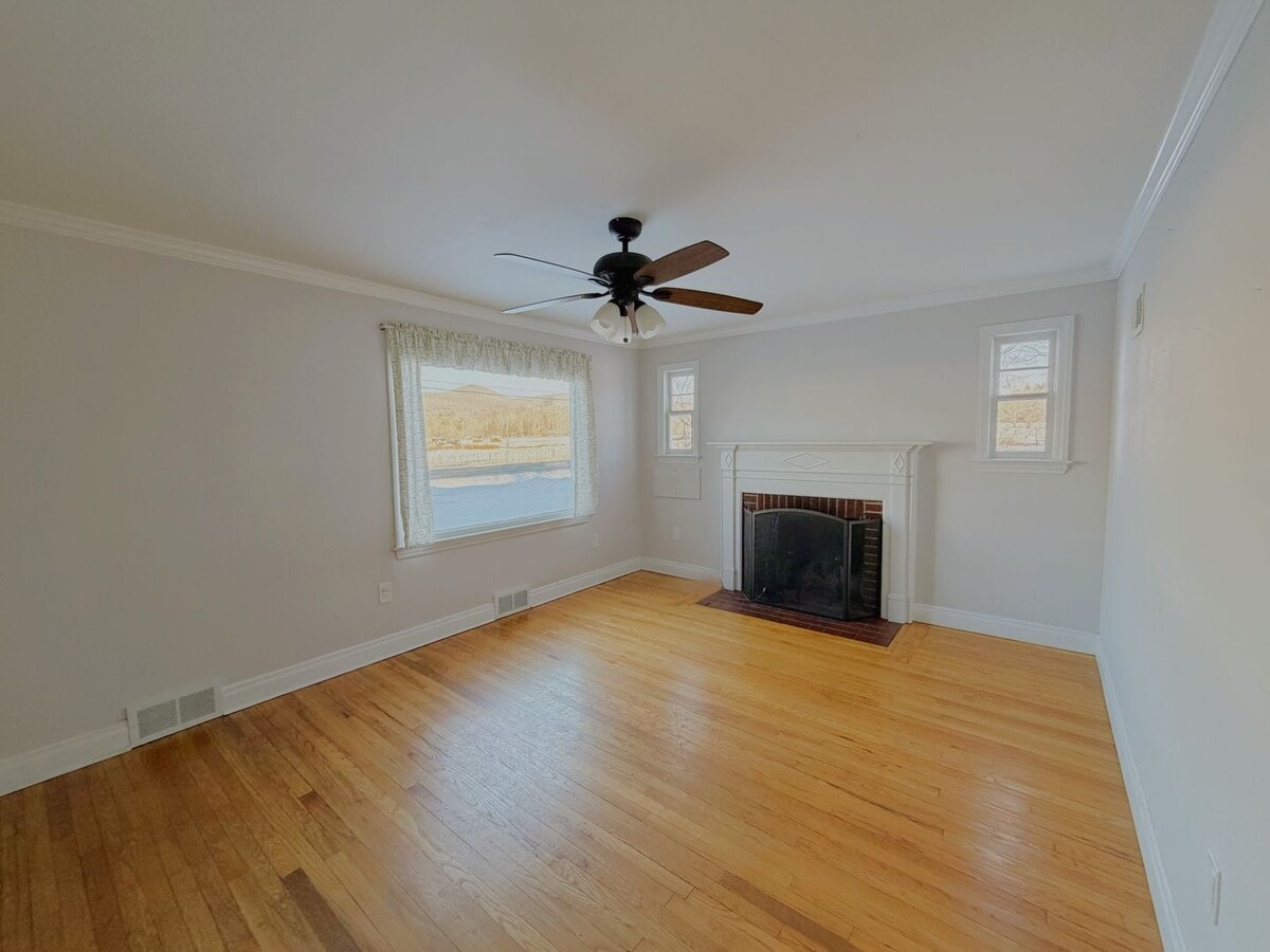 Photo - Single-Family Home with Scenic Views, Large Yard & Spacious Bedrooms