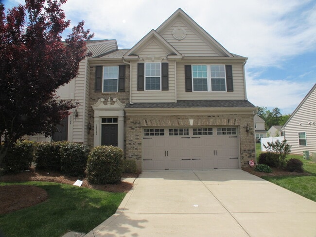Building Photo - Beautiful End Unit Townhome in the McCarle...