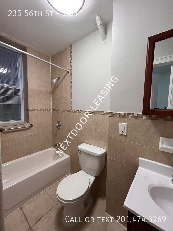 Photo - 235 56th St Apartamento Unidad 1AM