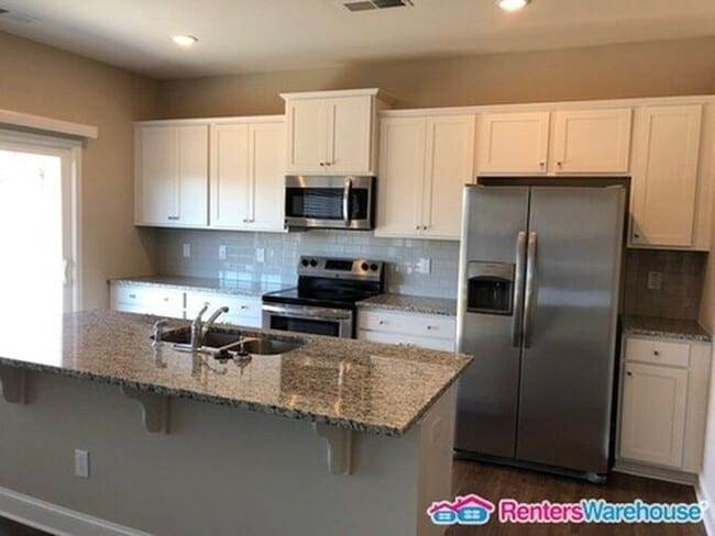 Photo - Beautiful 4 bedroom home with a fenced yard!