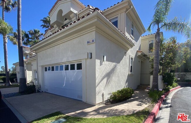 Building Photo - 6483 Zuma View Pl Unit 104