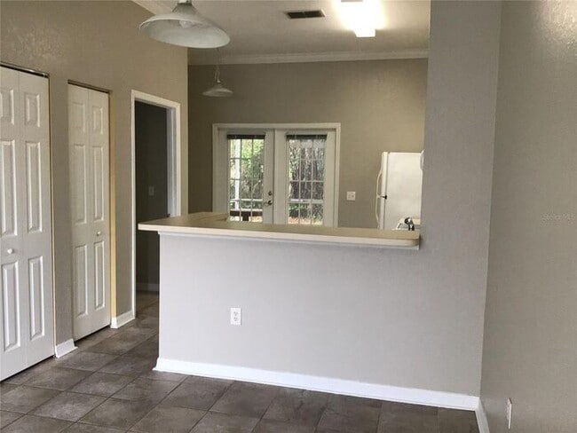 Photo - 2 Bedroom 2 Bath Corner Unit Ground Floor Condo Near UCF with Tile Flooring and Scenic View!