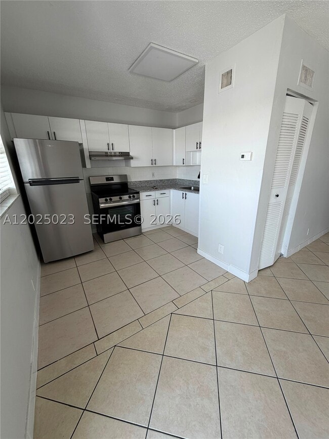 Building Photo - 351 NW 42nd St Unit 208