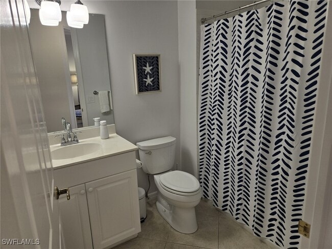 Building Photo - 5095 Yacht Harbor Dr Unit 203