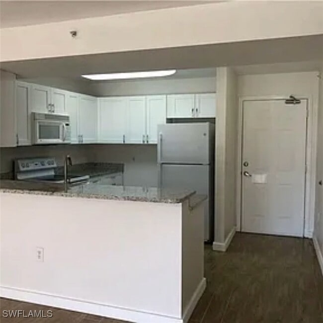 Building Photo - 8304 Key Royal Cir Unit 1712