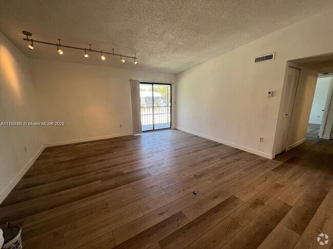 Building Photo - 9715 Hammocks Blvd Rental