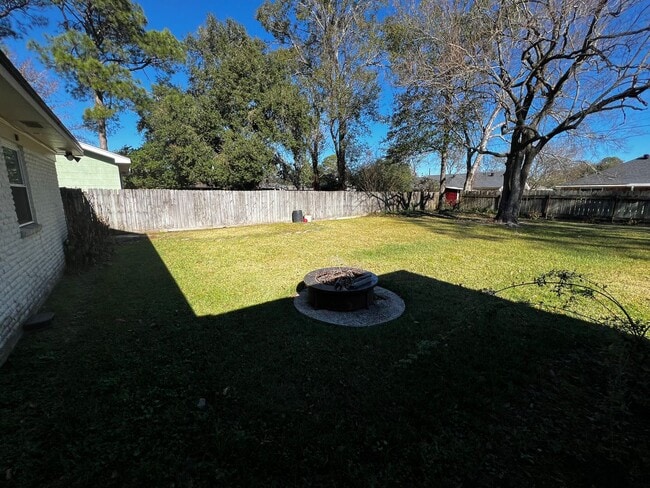 Photo - 2 Bedroom, 1 bathroom, Brick home , Stainless appliances, with Large Yard and Covered Parking.