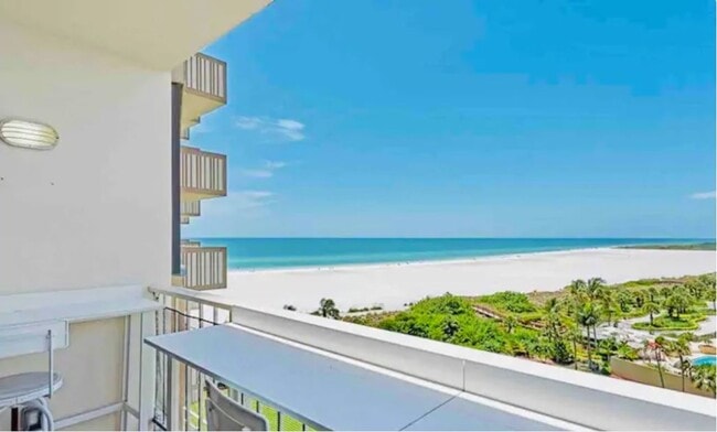View of beach from balcony - 58 N Collier Blvd Unit 210